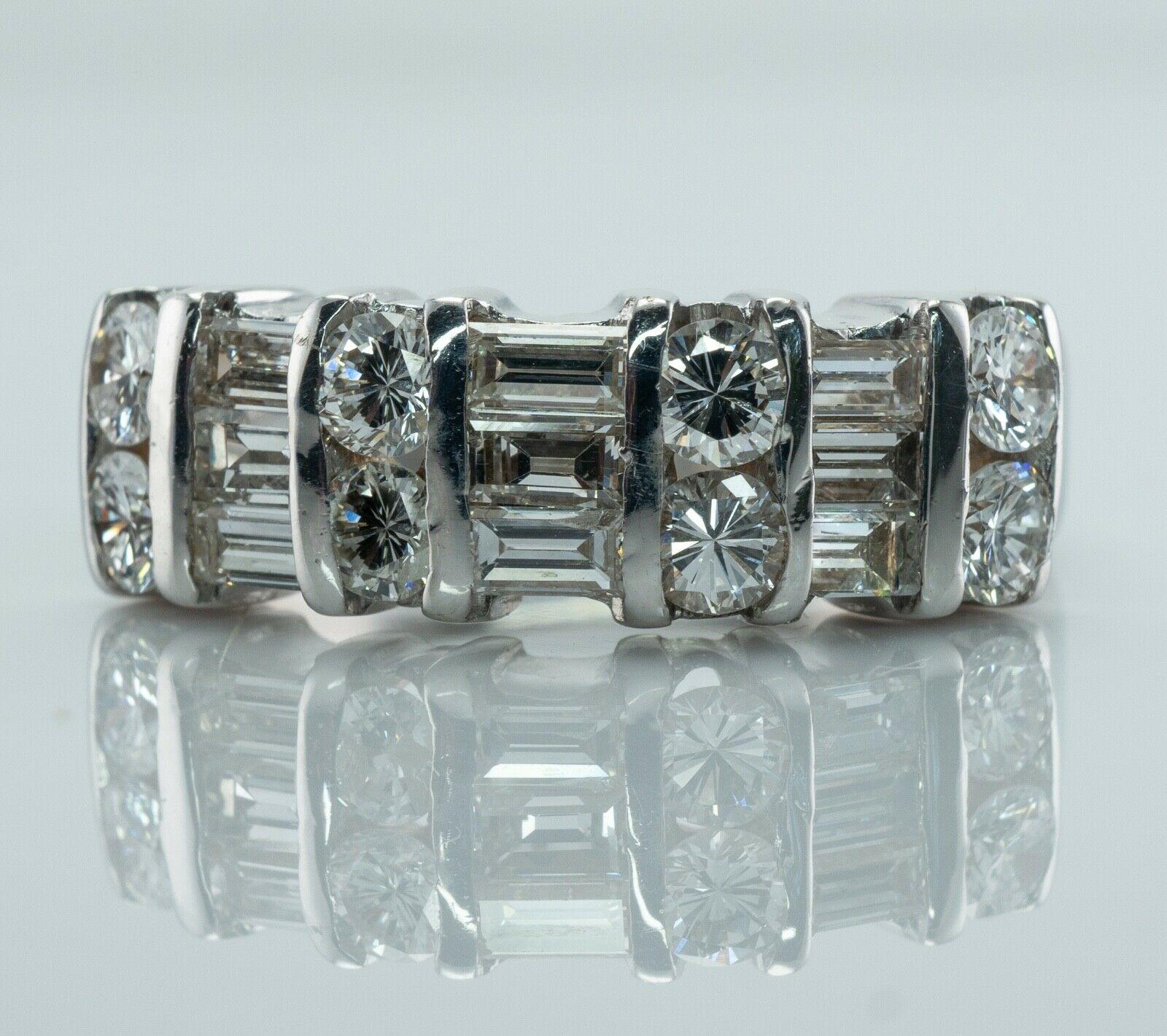 This beautiful estate diamond ring is finely crafted in solid 14K White Gold.
Eight round cut diamonds total .64 carat. Seven diamond baguettes total .63 carat.
One round cut and one baguette has small chips on the surface that cannot be seen