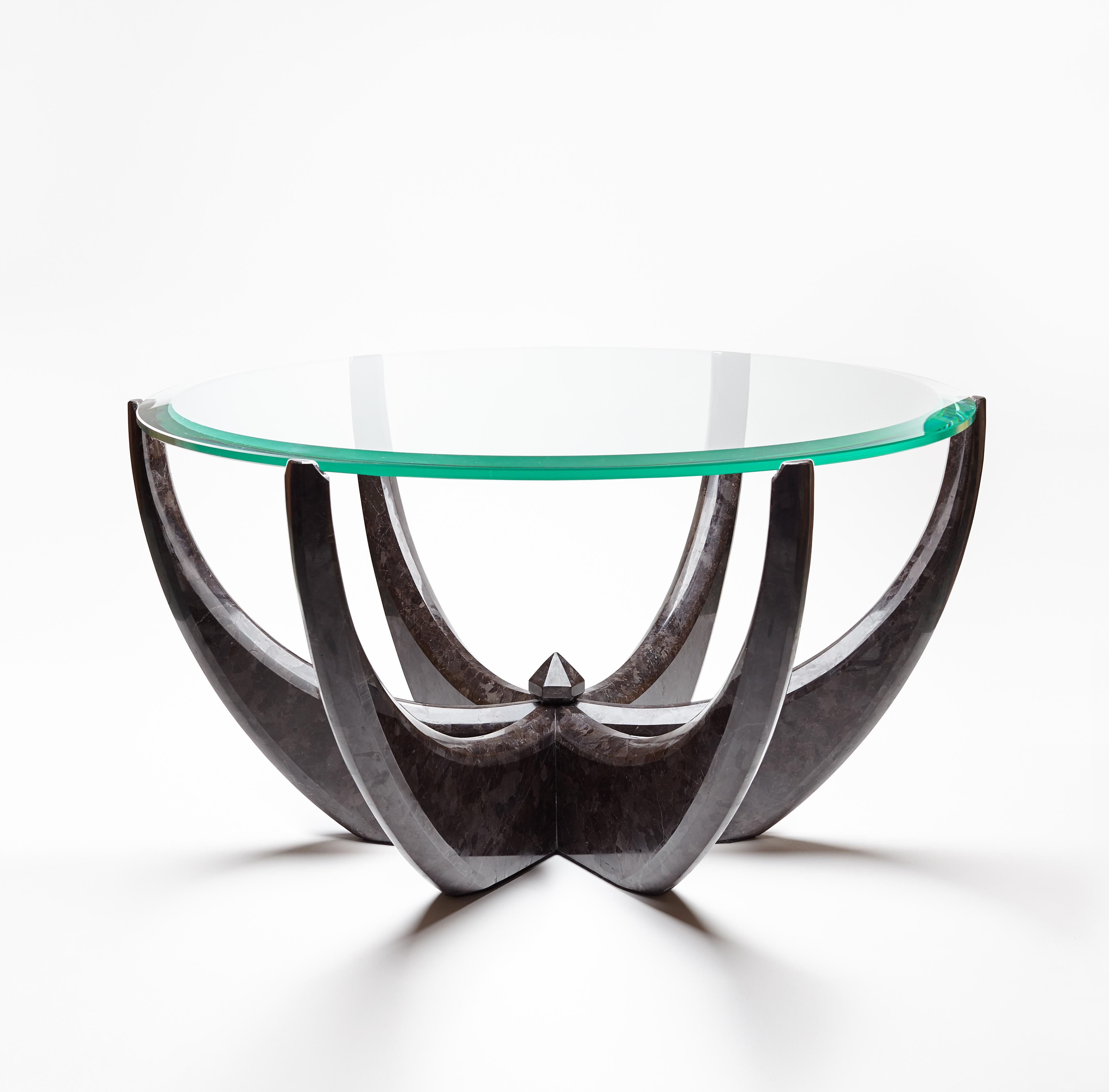 The diamond ring center table, 1 of 1 by Grzegorz Majka
Edition 1 of 1
Dimensions: 31.50 x 31.50 x 17.72 in
Materials: glass top. Marble onyx base. 


The Diamond collection proves that everything is possible. It goes beyond the stereotypical
