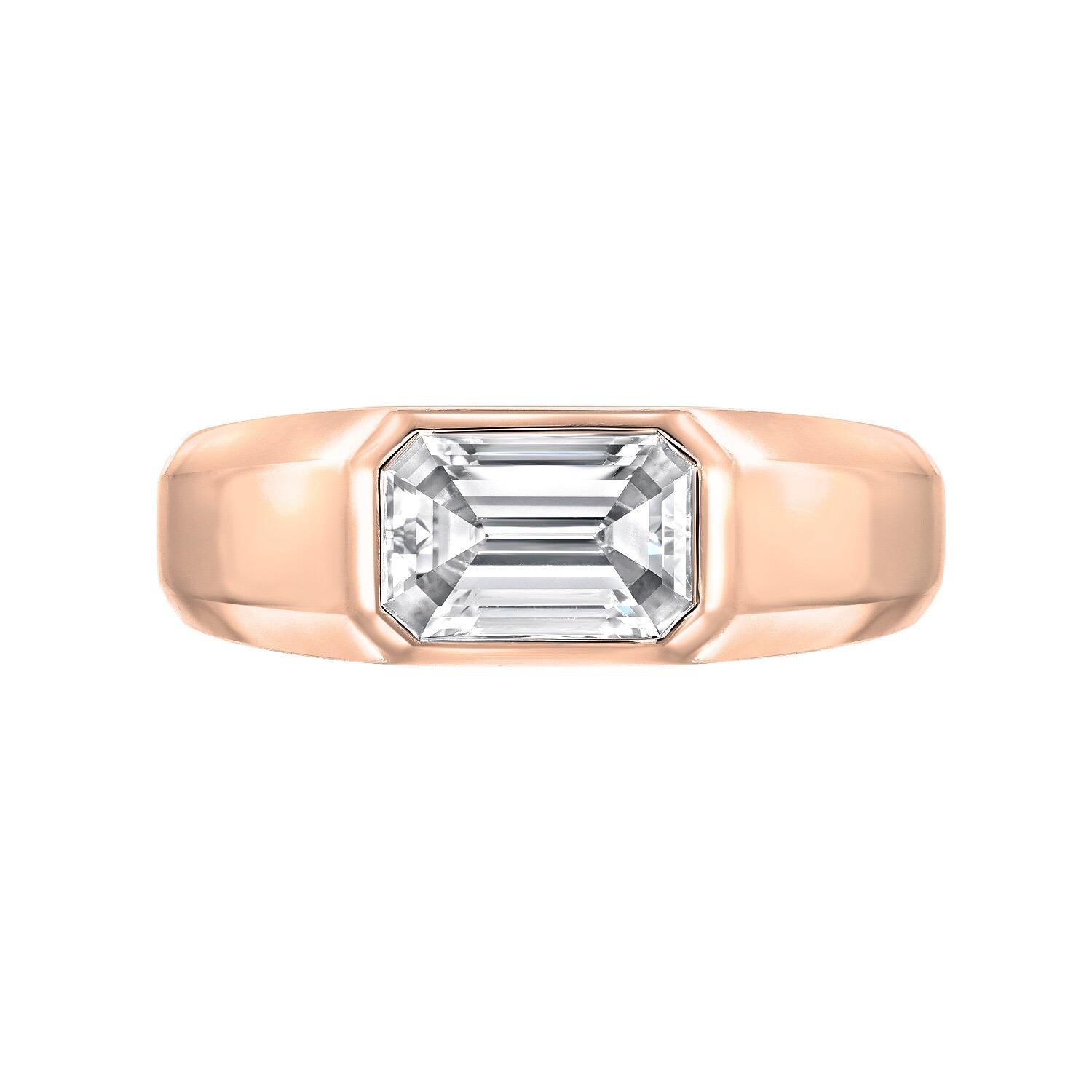 Emerald Cut diamond ring featuring a G.I.A certified 1.02 carat E color and VVS2 clarity emerald cut diamond, set in a pristine, hand crafted, 18K rose gold unisex ring. 
The G.I.A certificate is attached to the images for your convenience. 
Please