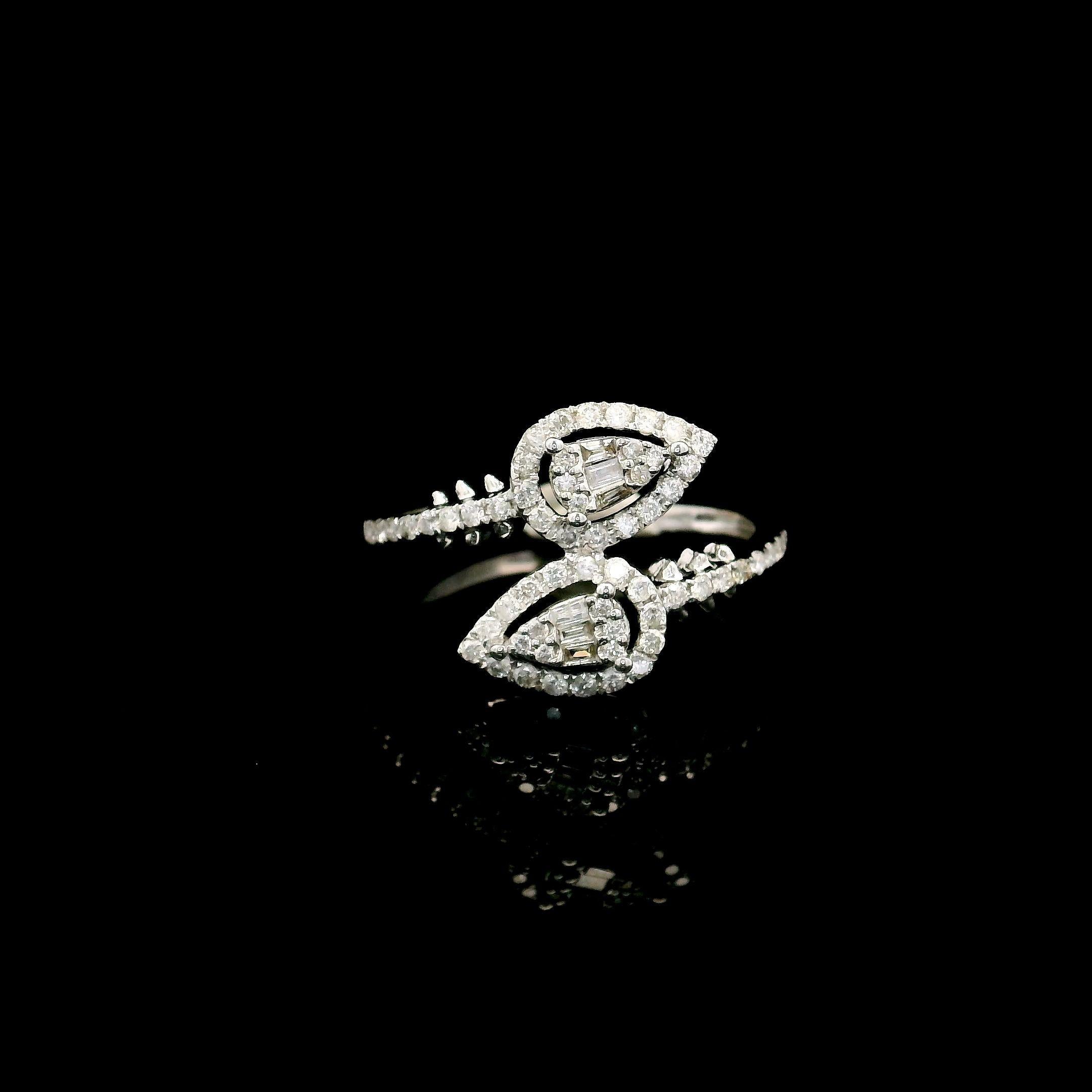 18kt white gold ring with diamonds
  
  Gold colour & karat: White gold 18kt
  Weight: 2.124 grams
  
  Set with-
  Stone type: Diamonds
  Shape: Pear
  Carat: 0.45 ct
  Colour: -
  Clarity: -