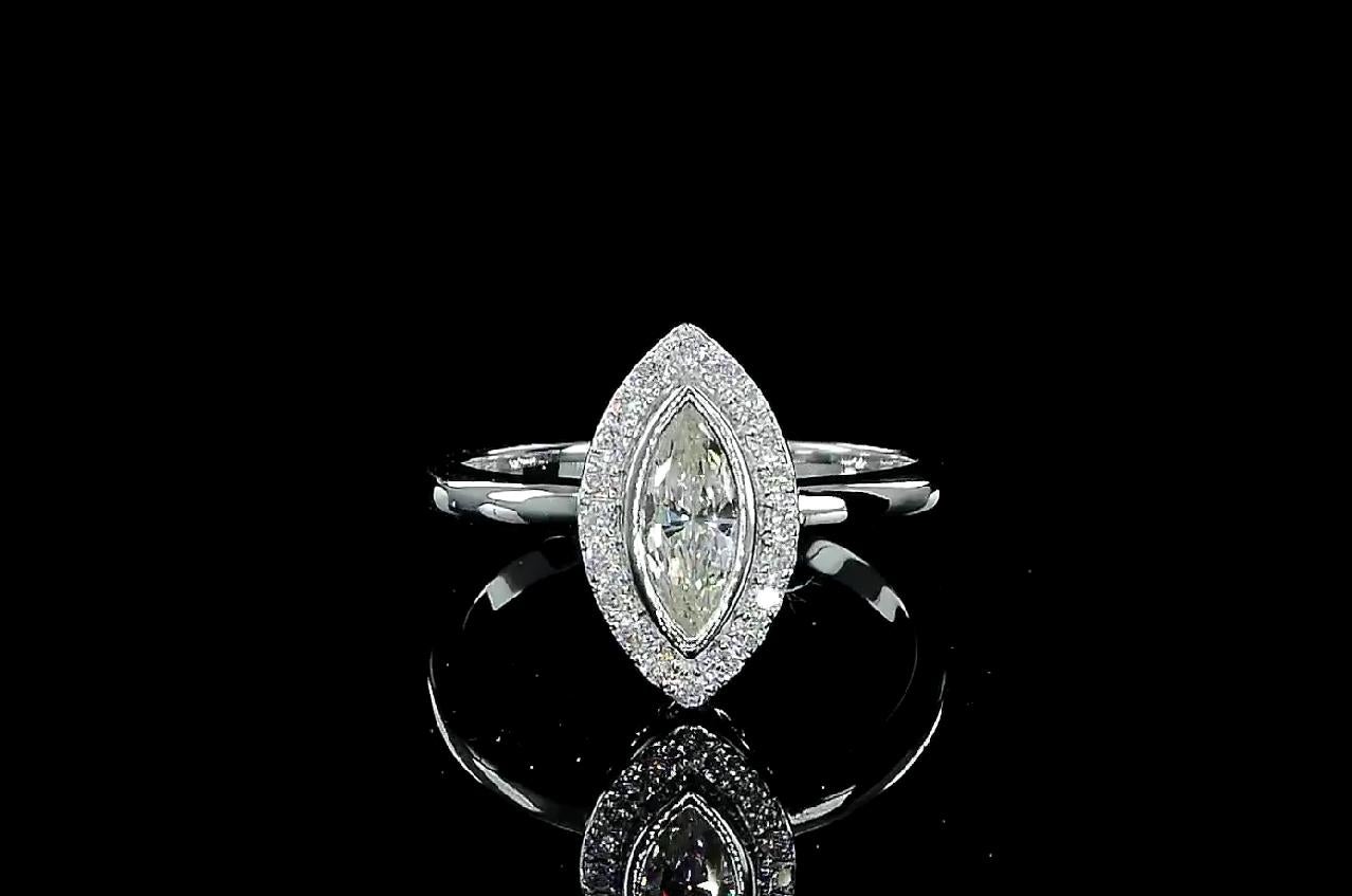 Anello in oro bianco 18 carati con diamanti
  
  Colore e caratura dell'oro: Oro bianco 18kt
  Peso: 3.81 grammi
  
  Imposta con...
  Tipo di pietra: Diamanti
  Forma: Marquise
  Carati: 0,34
  Colore: -
  Chiarezza: -
  
  Pietre circostanti: