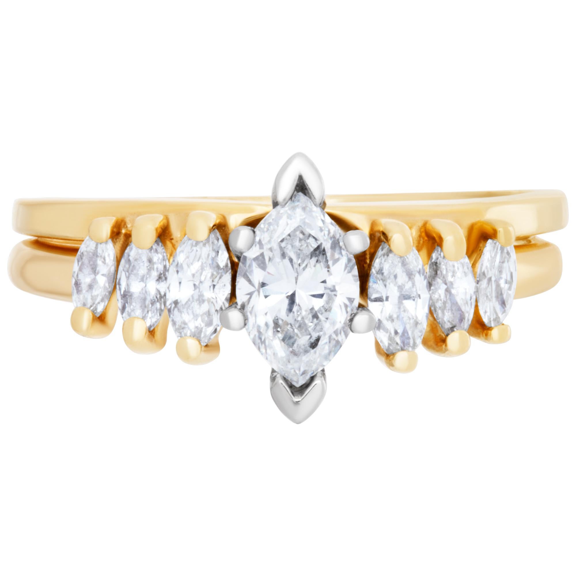 Diamond ring in 14k yellow gold with 0.50 cts in marquise diamonds (G Color SI-1 Clarity) w/ matching band. Size 6.5.This Diamond ring is currently size 6.5 and some items can be sized up or down, please ask! It weighs 2.7 pennyweights and is 14k.