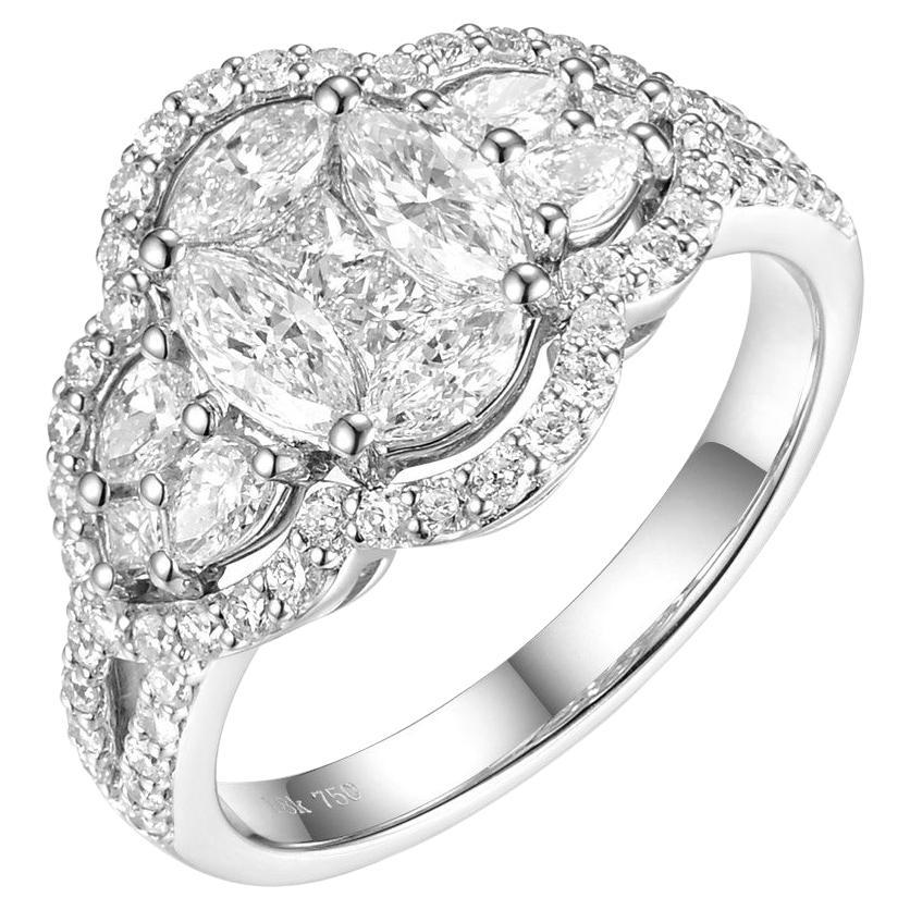 Introducing our Illusion Diamond Ring in Oval Shape 18 Karat White Gold, a mesmerizing piece that combines the beauty of multiple diamond cuts in a captivating design. This ring is a true testament to elegance and sophistication.

The centerpiece of