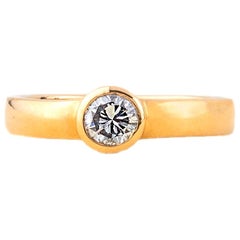 Bague en or jaune 18 carats et diamants