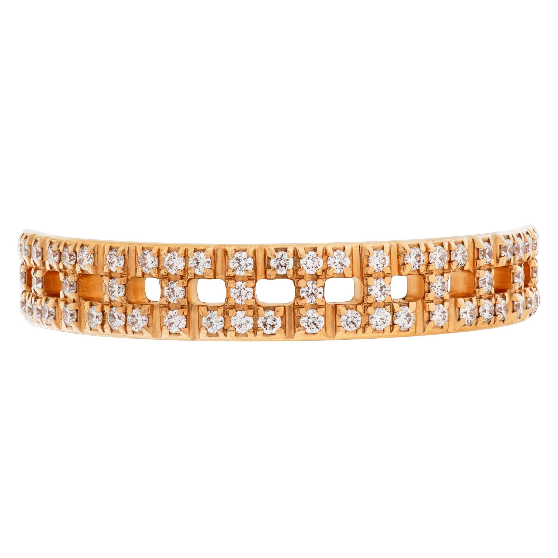 Tiffany & Co. T True Narrow ring part of the Tiffany T collection. 0.23 carats in pave diamonds in 18k rose gold. Ring size 7.<br /><br />This Tiffany & Co. ring is currently size 7 and some items can be sized up or down, please ask! It weighs 1.9