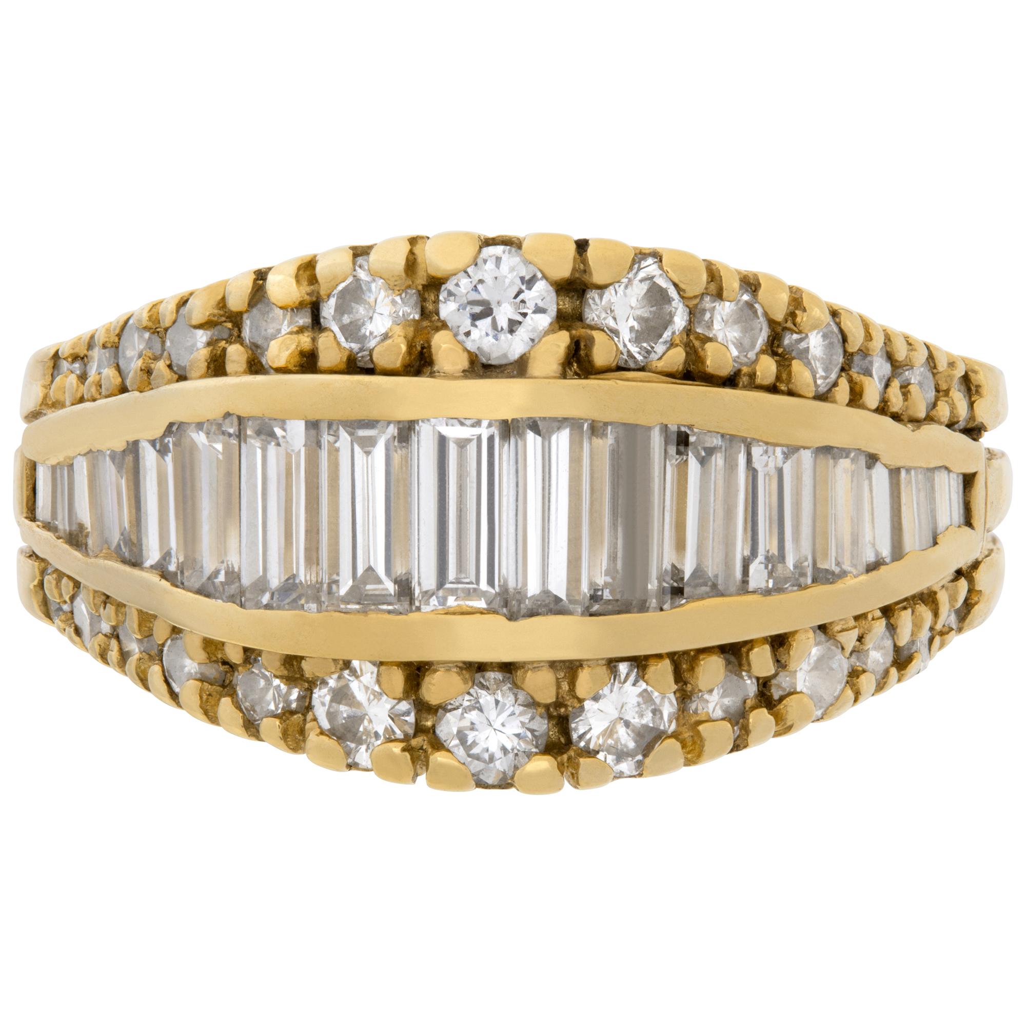 Diamond ring in 18k yellow gold with approx. 1.20 cts in round and baguette style white clean diamonds. Size 7. Ring has a very special look!This Diamond ring is currently size 7 and some items can be sized up or down, please ask! It weighs 5.2