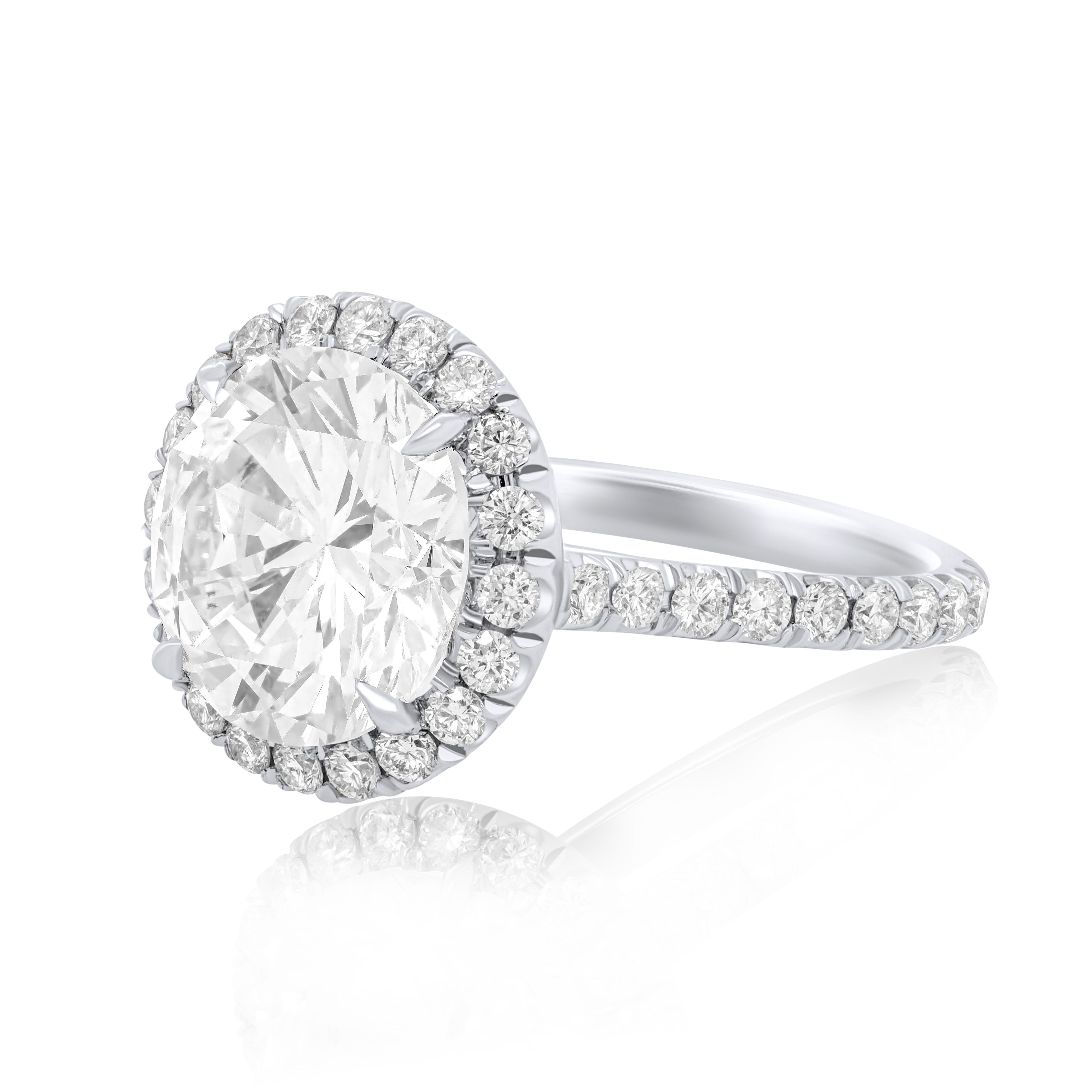 Round Cut 4.54 Carat Diamond Ring in Platinum Setting with Micropave Diamonds For Sale