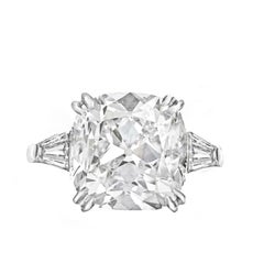 Diamond Ring in Platinum Setting with Two Tapered Baguettes on Each Side