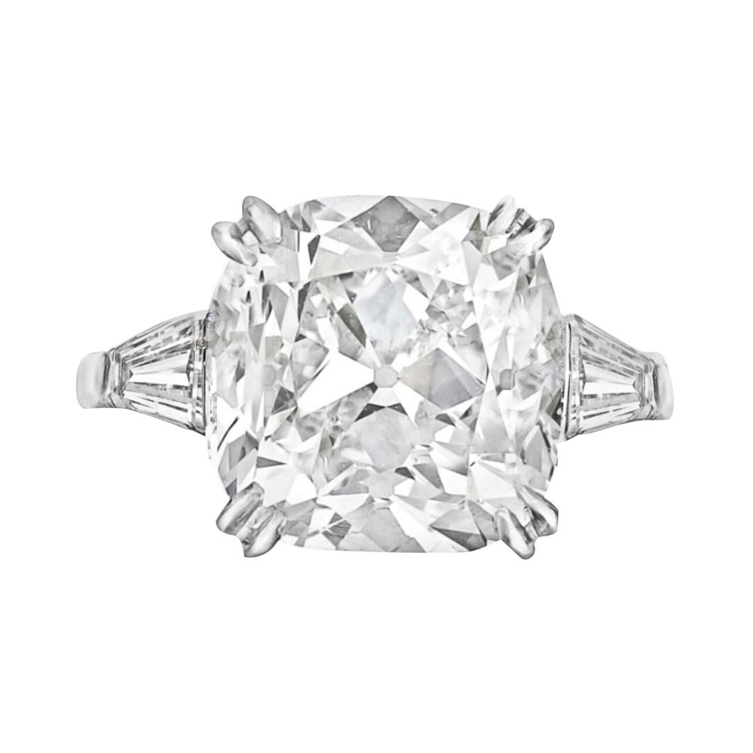 Diamond Ring in Platinum Setting with Two Tapered Baguettes on Each Side For Sale