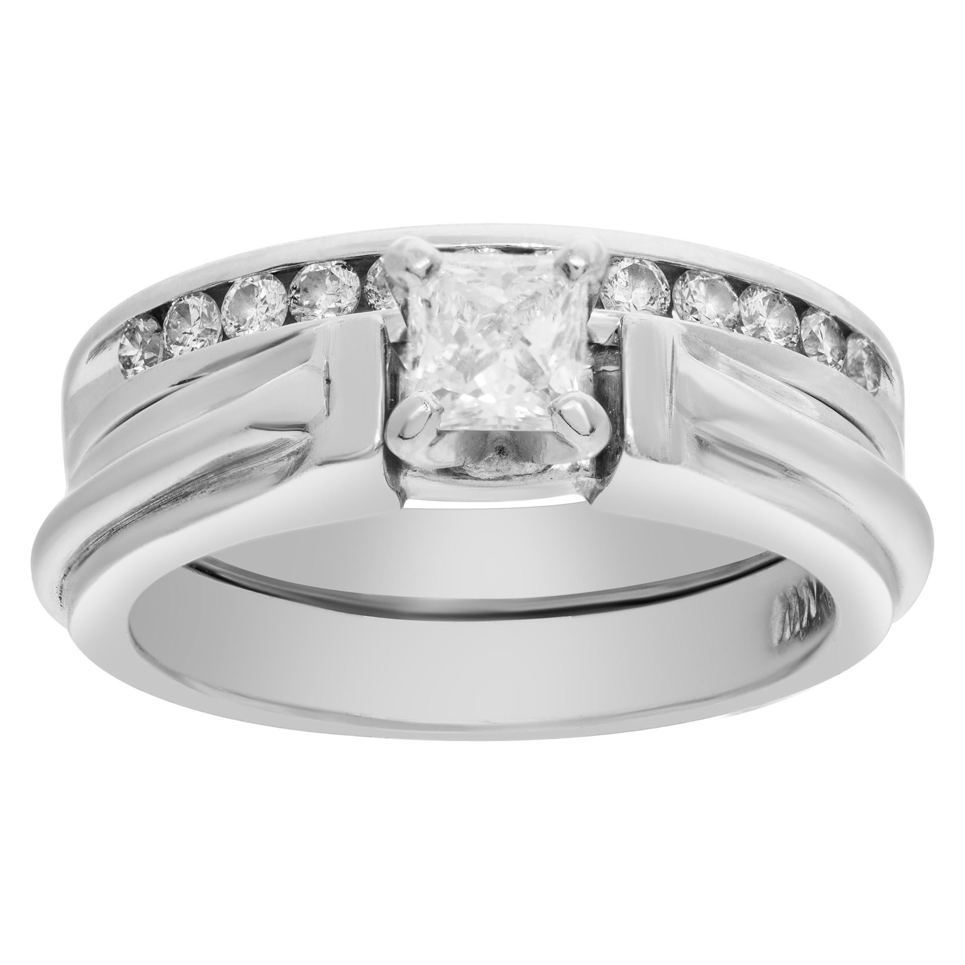 Stunning round and princess cut diamond ring in platinum with approximately 0.50 carat diamonds. Size 4.5.

This Diamond ring is currently size 4.5 and some items can be sized up or down, please ask! It weighs 6.8 pennyweights and is Platinum.