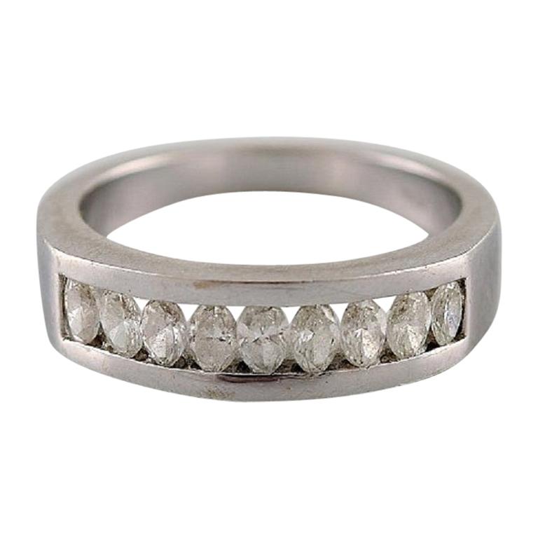 Diamond Ring of 14 Carat White Gold with 9 Oval Diamonds For Sale