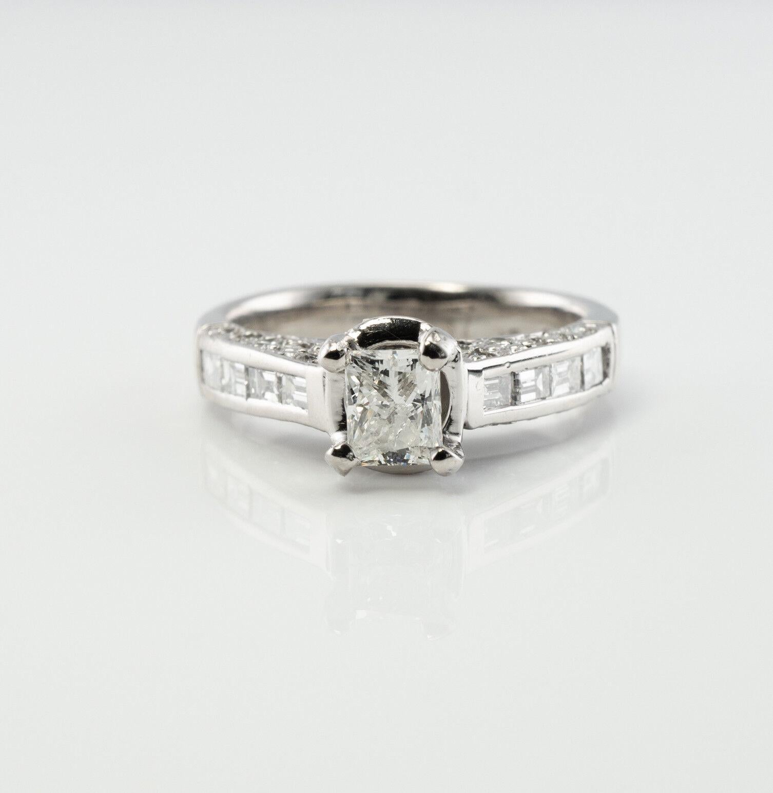 Diamond Ring Platinum Band 1.40 TDW EGL Certified

This incredible ring is finely crafted in solid Platinum and set with genuine sparkling diamonds. The center diamond has an EGL certificate stating this is .52ct gem of VS2 clarity and G color. The