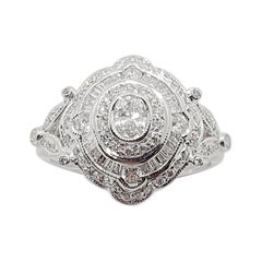 Anello con diamante incastonato in oro bianco 18 carati