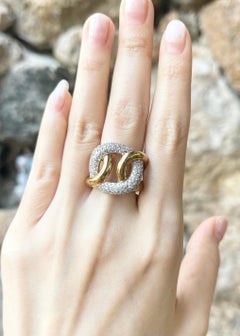 Diamond Ring set in 18K Gold Settings