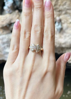 Diamond Ring set in 18K Gold Settings