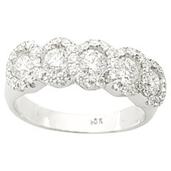 Anello con diamante incastonato in oro bianco 18 carati
