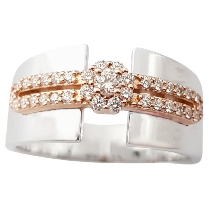 Anello con diamante incastonato in oro bianco/rosa 18 carati