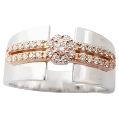 Anello con diamante incastonato in oro bianco/rosa 18 carati