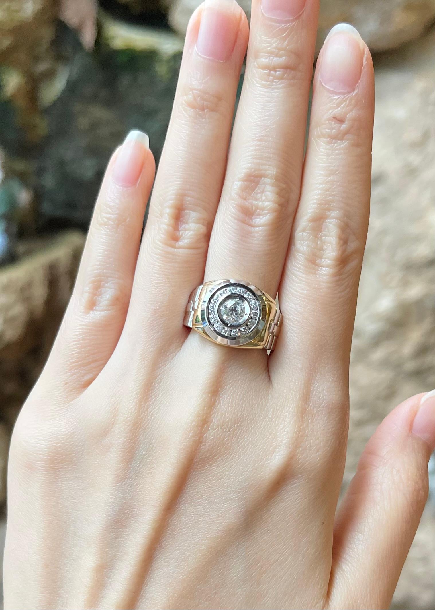 Bague en or jaune/blanc 18K sertie d'un diamant de 0,50 carat et d'un diamant de 0,35 carat

Largeur :  1.6 cm 
Longueur : 1,4 cm
Taille de l'anneau : 58
Poids total : 14,05 grammes

