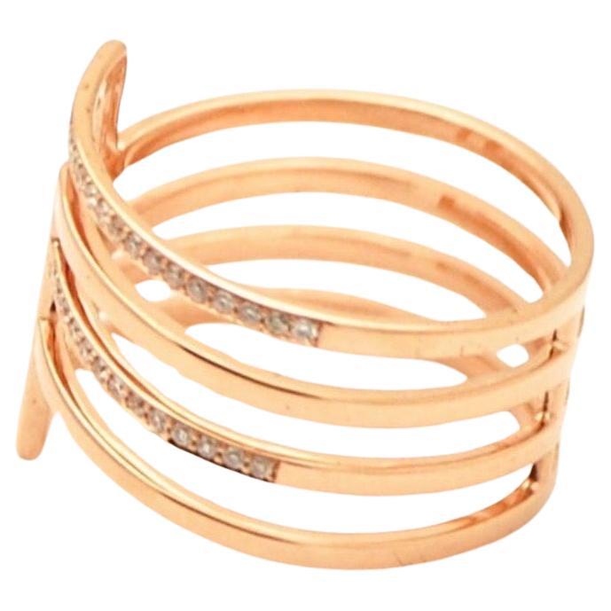 Bague en or rose 18KT, très moderne, diamants totalisant 0.50 carats, pureté VS et couleur F, originaire du Canada. La bague est fabriquée avec une grande qualité en taille 7. La bague peut être facilement redimensionnée. Le colis sera accompagné