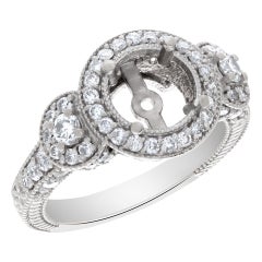 Bague avec diamants ronds brillants d'environ 1 carat, sertis en serti clos