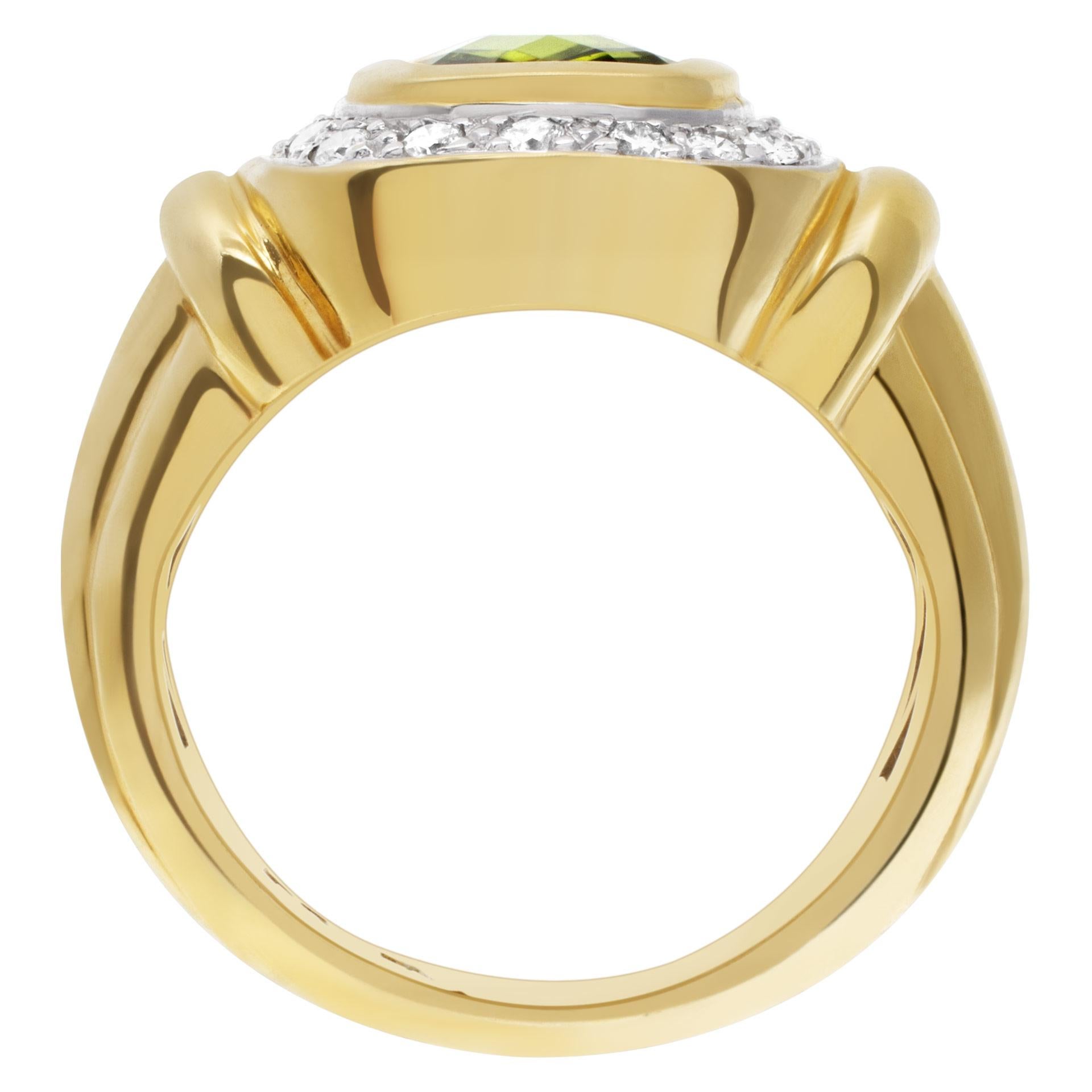 Diamantring mit zentralem Peridot aus 18k Gelbgold ca. 072 Karat Damen