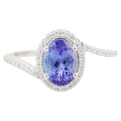 Bague en or blanc 18 carats avec diamants et tanzanite