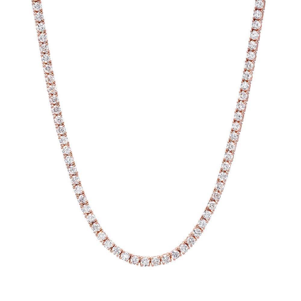 Classic 14K rose gold diamond Tennis necklace, set with a total of approximately 4.68 carats, F color and VS2 clarity, round brilliant diamonds.
Total length is 16