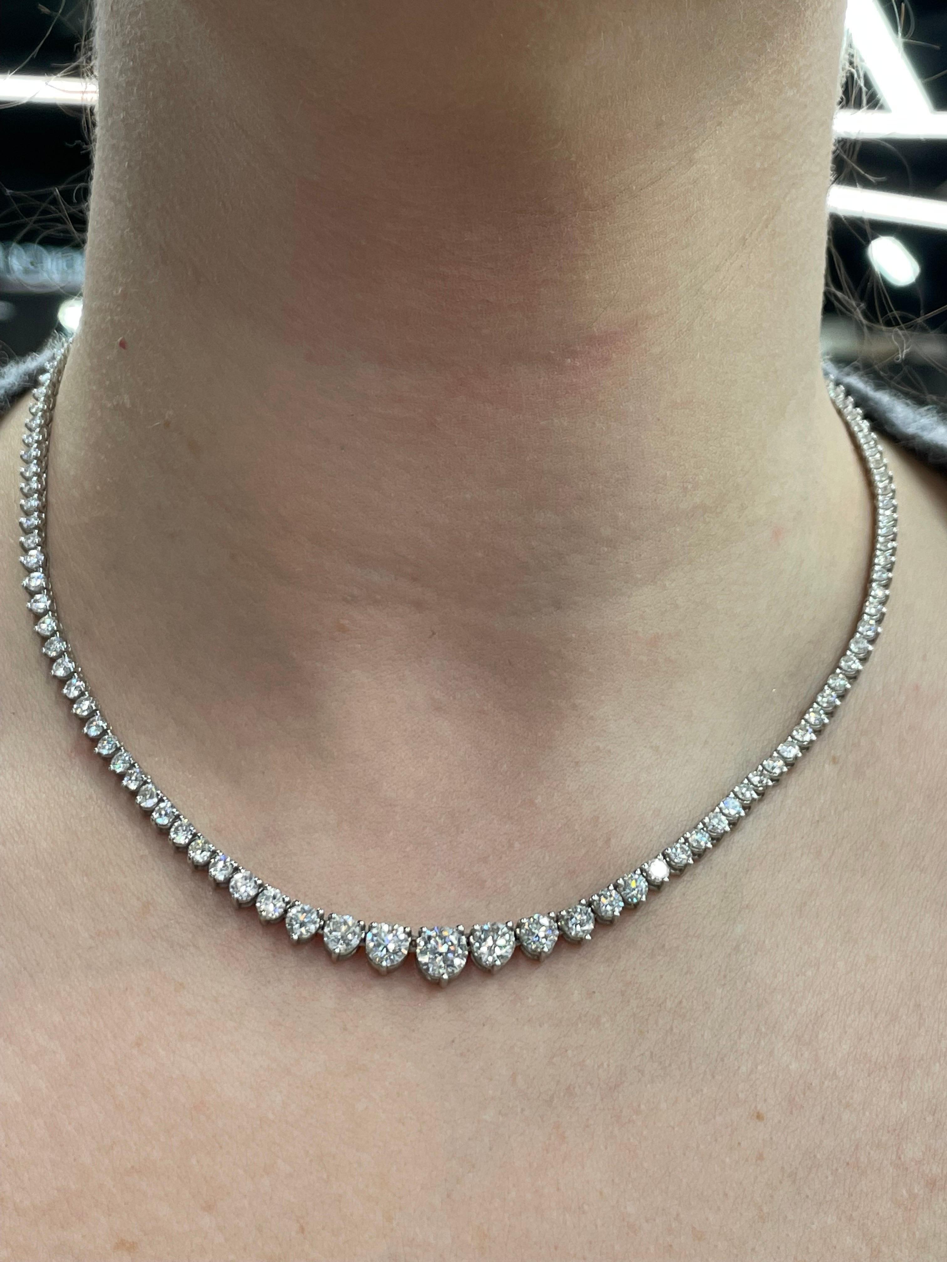 Diamond Riviere necklace featuring 153 round brilliants weighing 10.02 Carats, in a 3 prong 14 Karat White Gold.
Center Diamond 0.90 Points
Two Side Diamonds 0.71 Total Weight 
Color H-I
Clarity SI-SI3

We manufacture Straight Line & Riviere