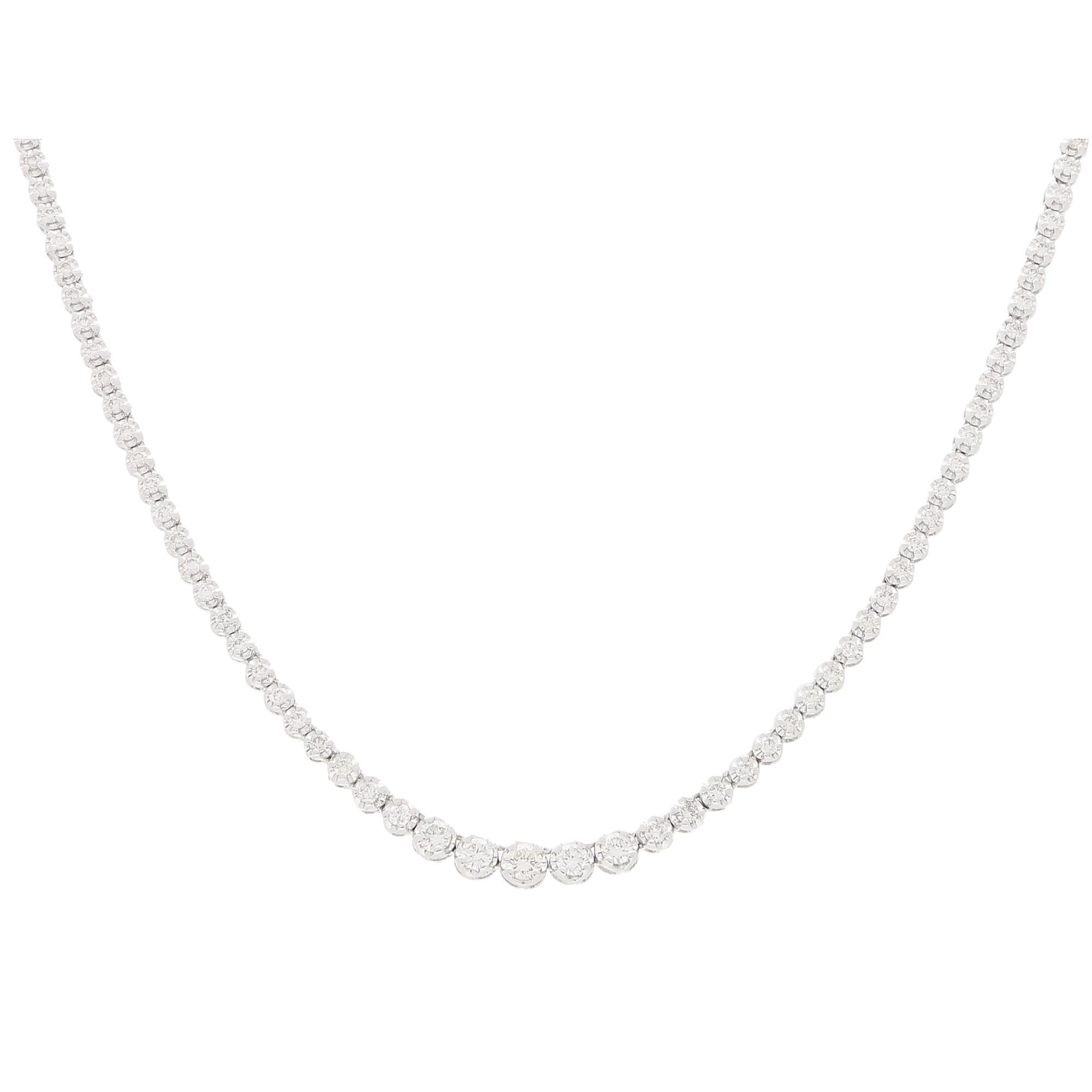 A beautiful diamond riviere necklace set in 18k white gold.

The necklace is composed of a staggering total of 137 diamonds all of which are individually four claw set in round articulated settings. 

Due to the design this necklace would be a