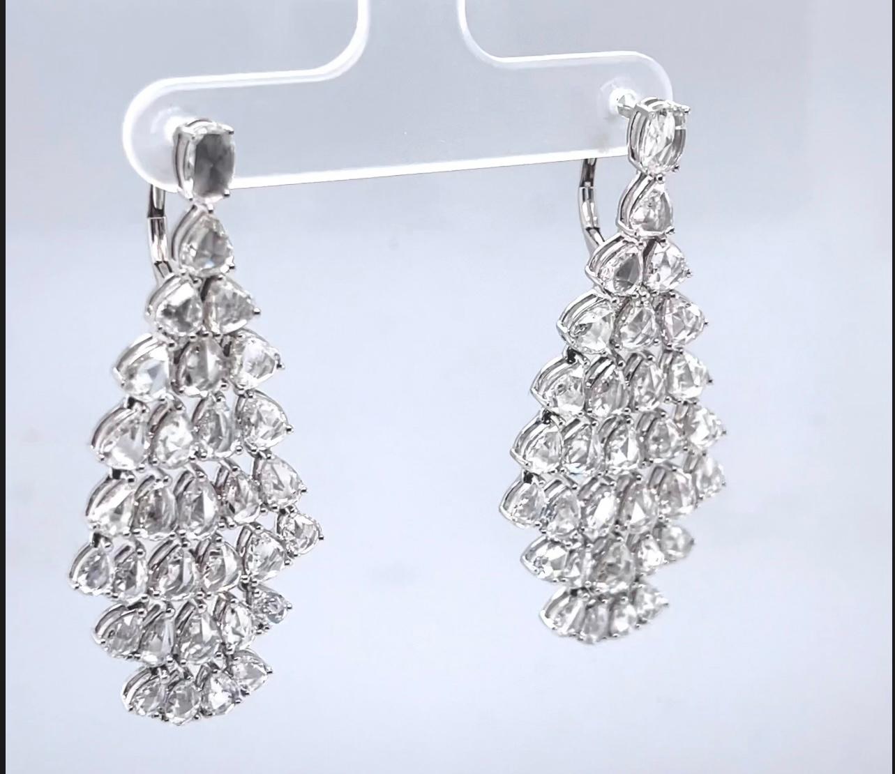 Rose Cut Diamond Chandelier Earrings

Total Carat Weight of 10.50 carats

F- H Color VS Clarity

Set in 18K White Gold

Length: 1.86 inches

Stock# : J5752

