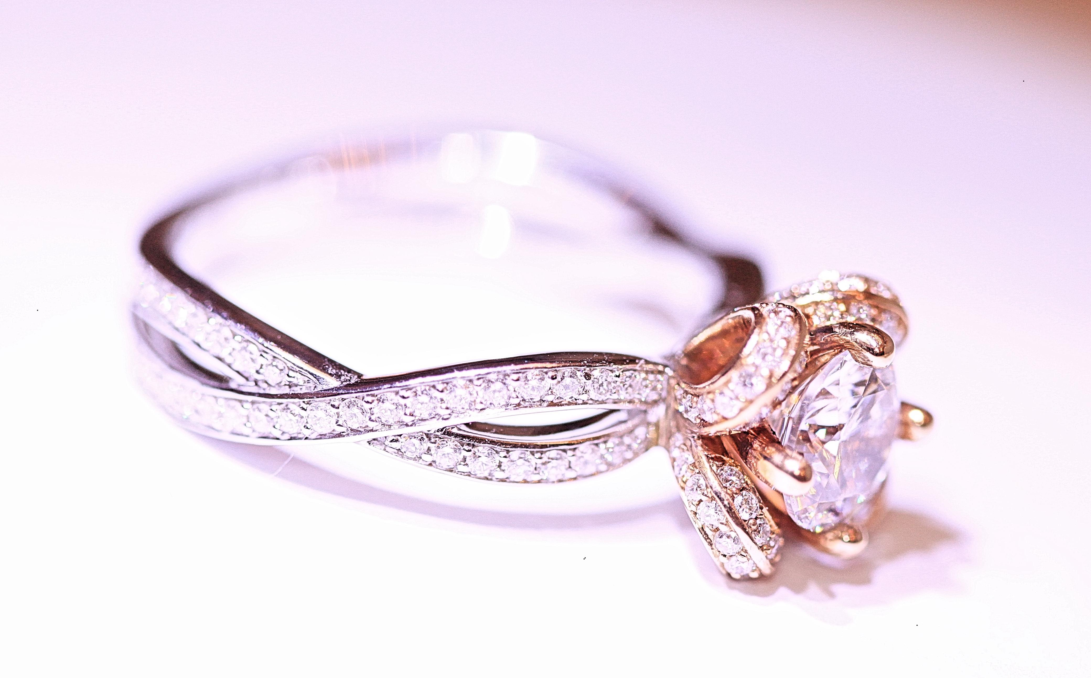 rose gold engagement rings on hand