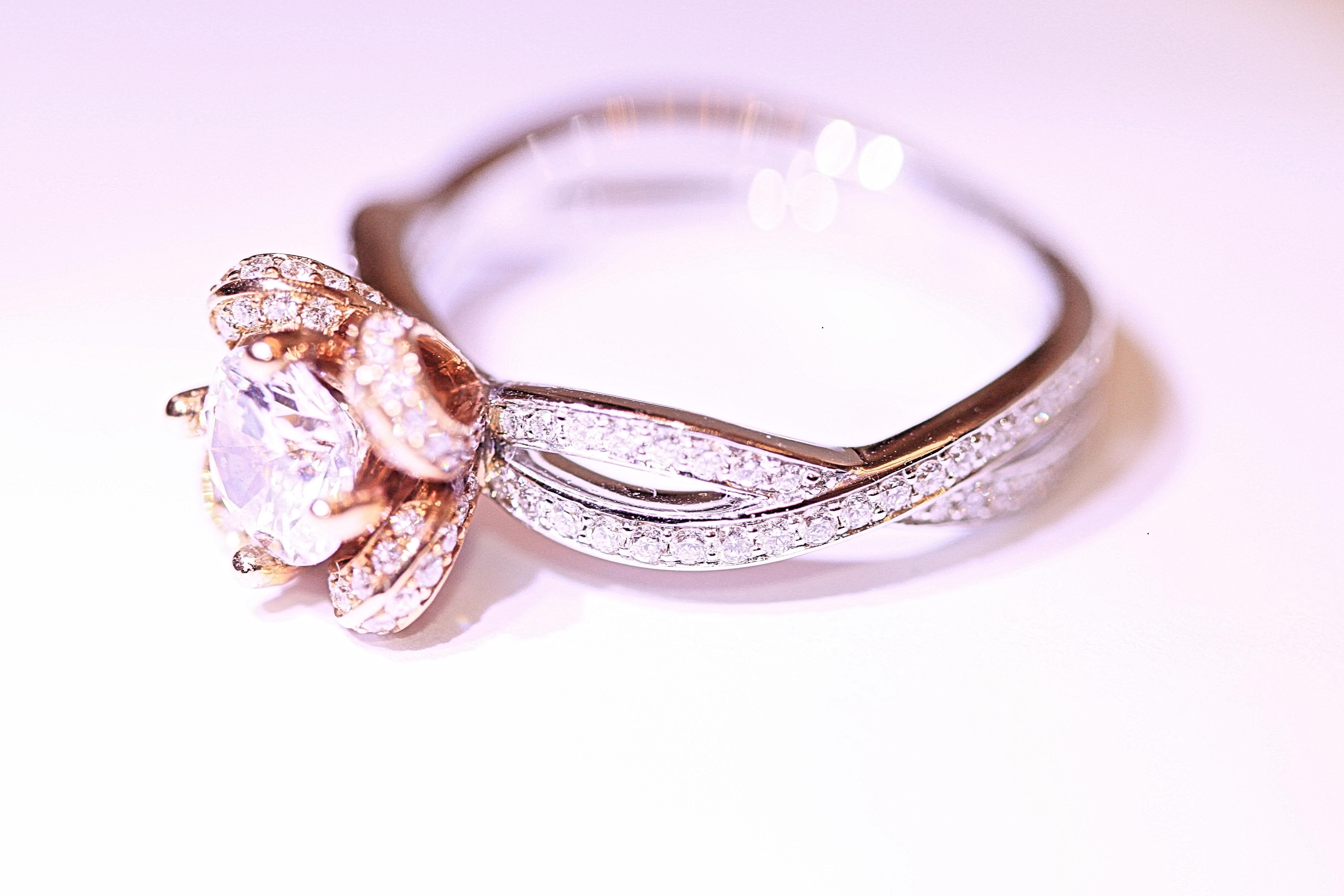 rose gold engagement ring on hand