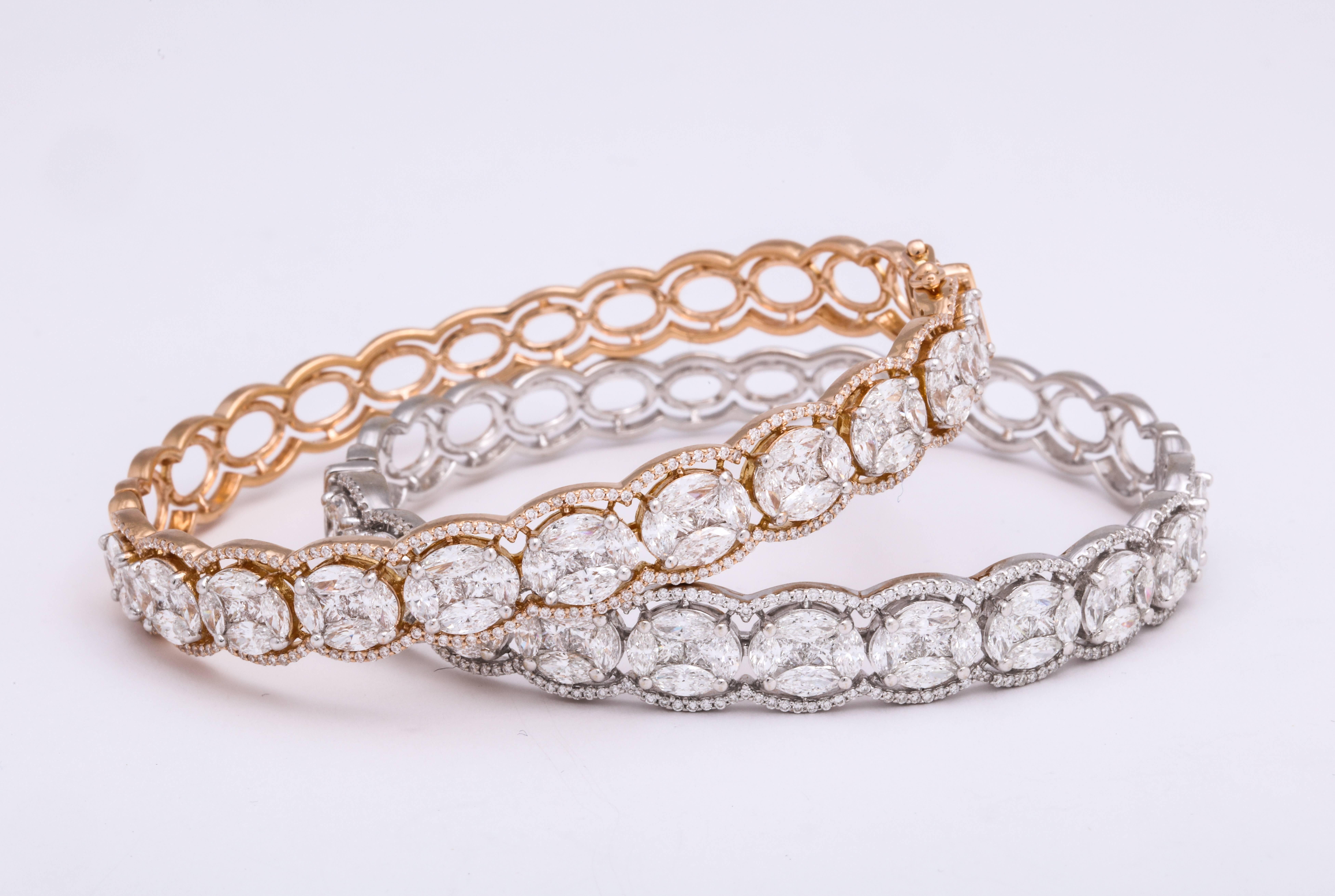Classic design and details on this pair (sold as a set) of 18 Karat rose gold and matching 18 Karat white gold stack bracelets with hinge that open and close, each mounted with 11 oval stations set with princess cut and marquise diamonds in the