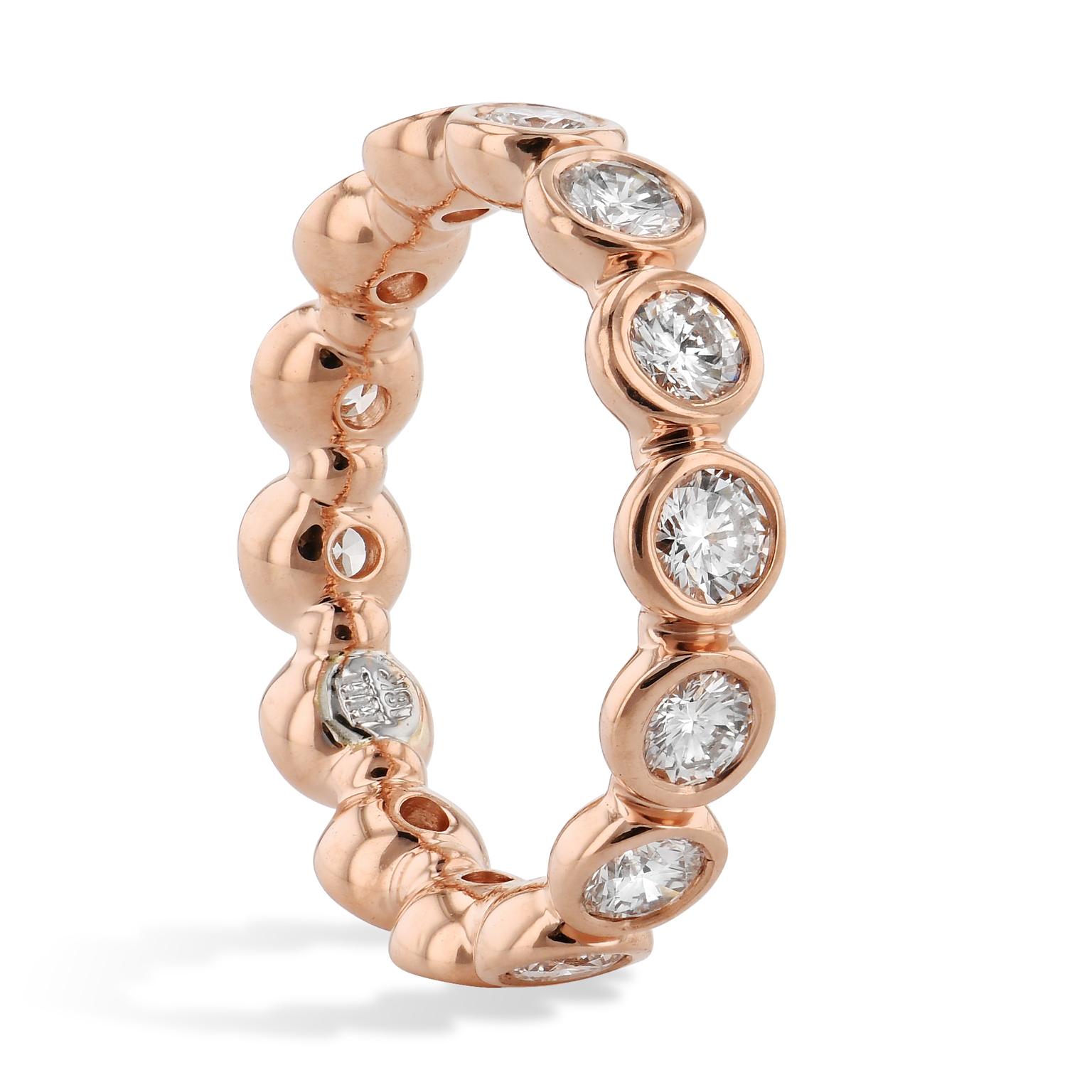 Feel rosy with this 18 karat rose gold eternity band, with a bezel set of 1.58 carats in diamonds(E/F/G, VS). Size 5.5.