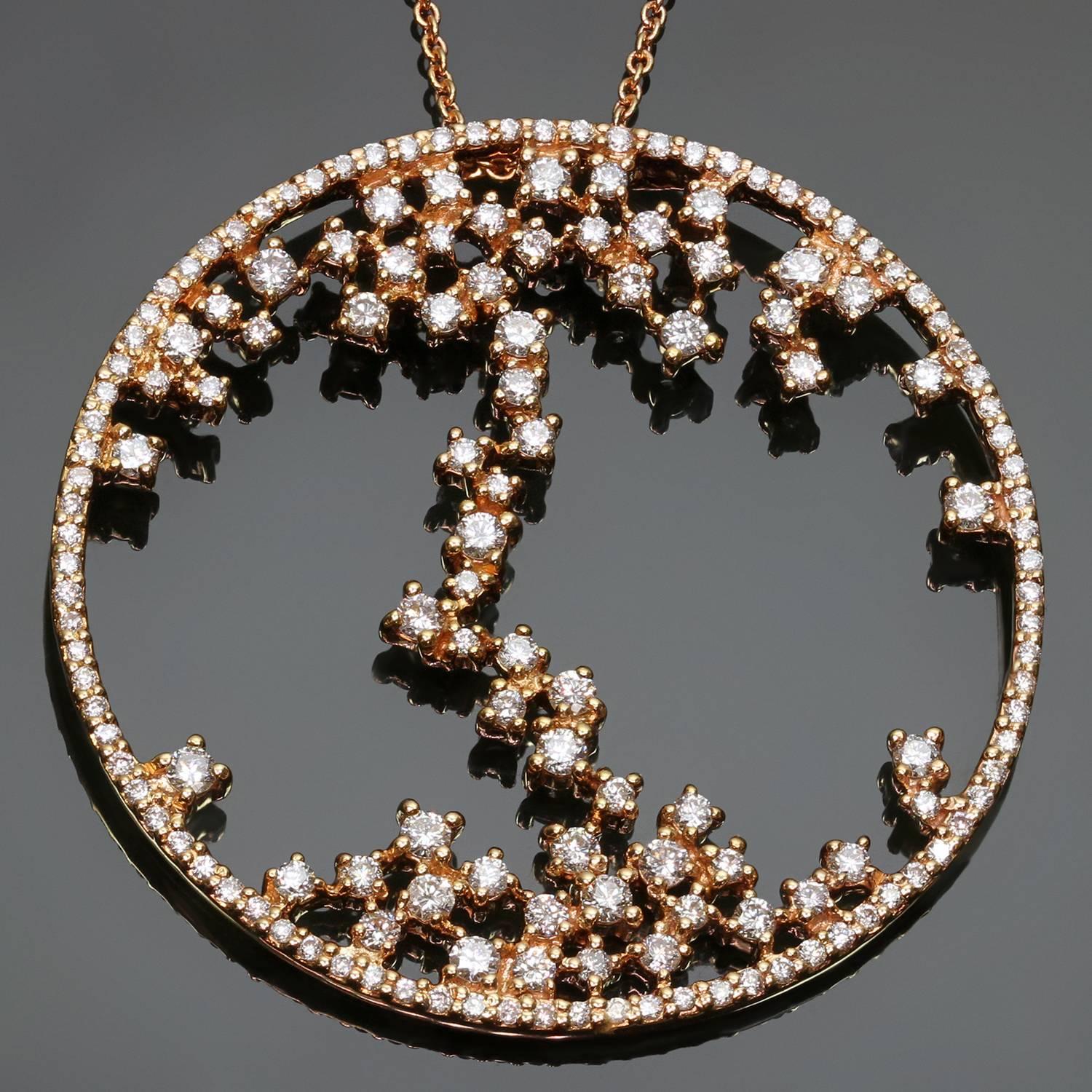 This elegant contemporary necklace is crafted in 18k rose gold and features a striking round pendant accented with about 162 round diamonds of an estimated 1.60 carats. Made in United States circa 2010s. Measurements: 1.53