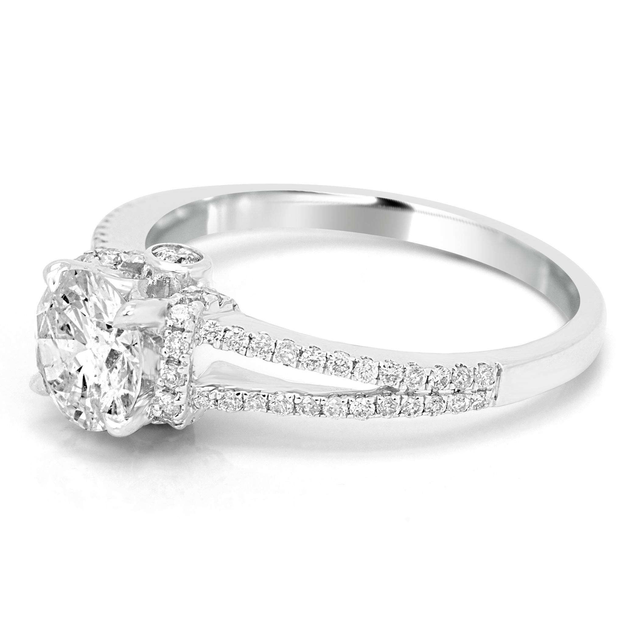 White G-H Color SI-I Clarity Diamond Round 0.92 Carat set in 14K white Gold Split Shank Bridal Engagement ring with 61 G-H Color SI-I Clarity Diamonds on the side 0.40 Carat.

Total Diamond Weight 1.32 Carat
Style can be customized or custom made as