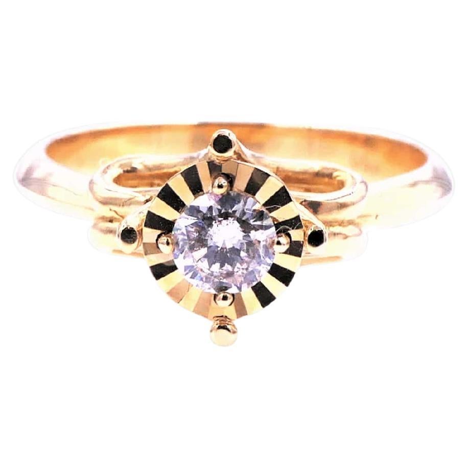 Diamond Round Brilliant Cut Silvery Grey Solitaire 18 Karat Yellow Gold Ring
0.30 cts Silvery Grey White Diamond
Very Beautiful & Sparkly 
18K Yellow Gold
Vintage Style with Ribbon Structure & Faceted Cut Basket
Size 7 - Sizeable Upon Request