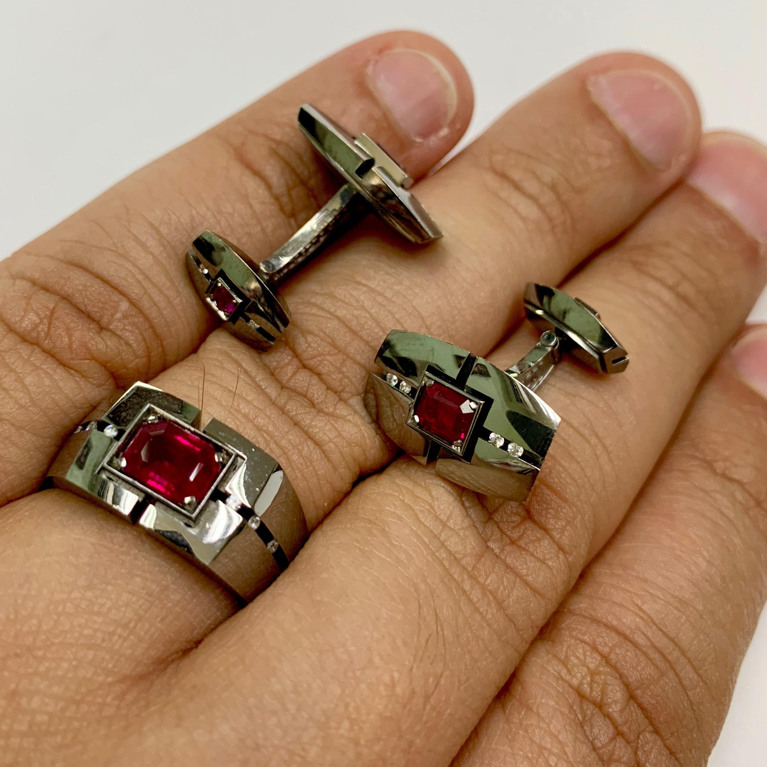 Diamond Ruby 18 Karat Black Gold Cufflinks and Ring Suite

Red and Black... Passion and Power blended together in this rugged design.
Diamonds are set with flying setting technique.
Please request a video link to check them out. 

Cufflinks