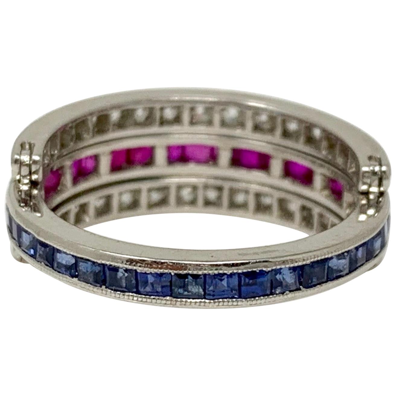 This unique ring by Moguldiam Inc features Diamond, Ruby, and Blue Sapphire. 
Diamond weight: 0.72 carat 
Ruby weight : 0.35 carat 
Sapphire weight : 0.35 
Ring size : 6 
Metal : Platinum 

