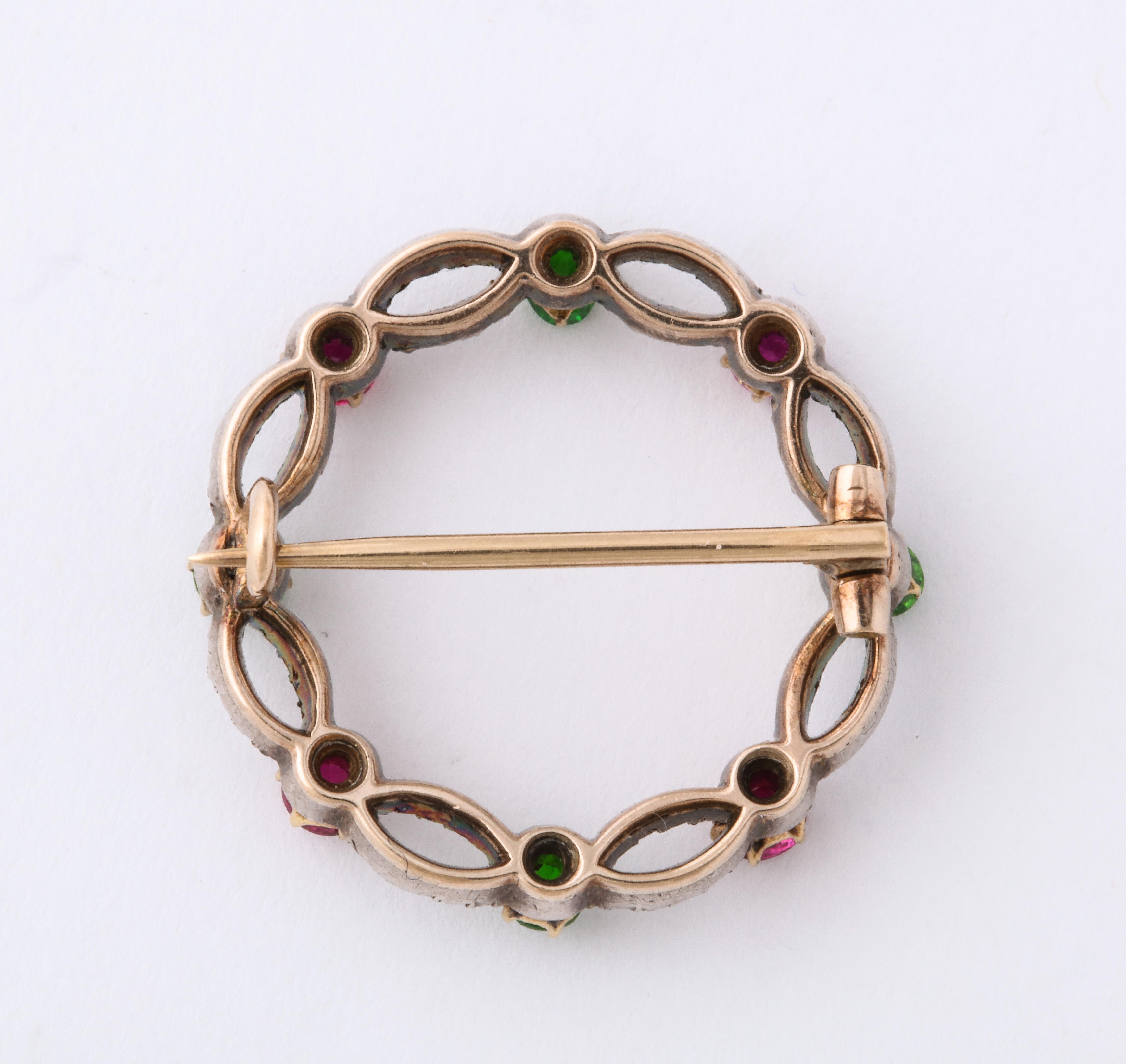 Diamond, Ruby, and Demantoid Garnet Brooch In Excellent Condition For Sale In New York, NY