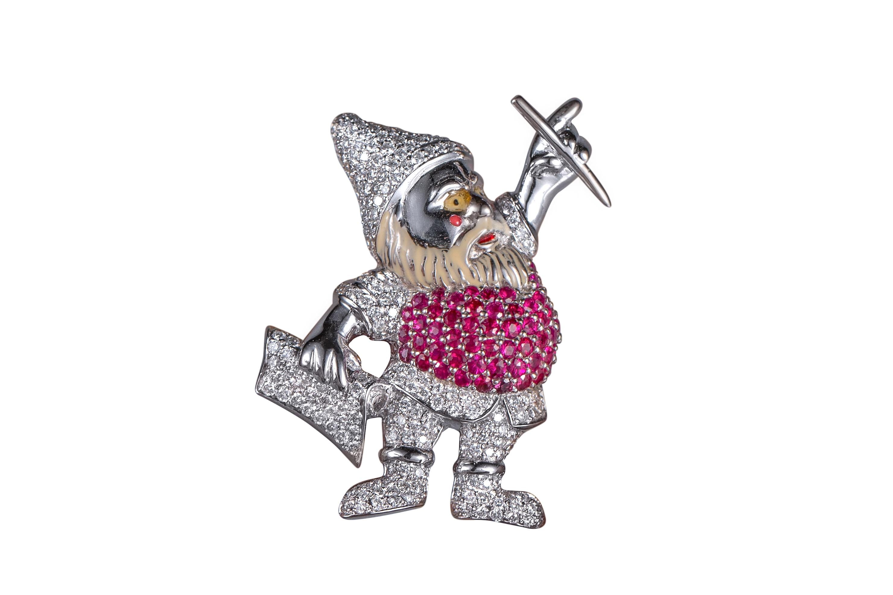 Item Details:
Metal Type: 18 Karat White Gold
Weight: 15 grams
Measurements: 2 inch height x 1 inch width 

Features:
Belly of Santa Claus features .8 carat total of Ruby
Eyes and Beard of Santa Claus feature Enamel
The rest of the pin brooch