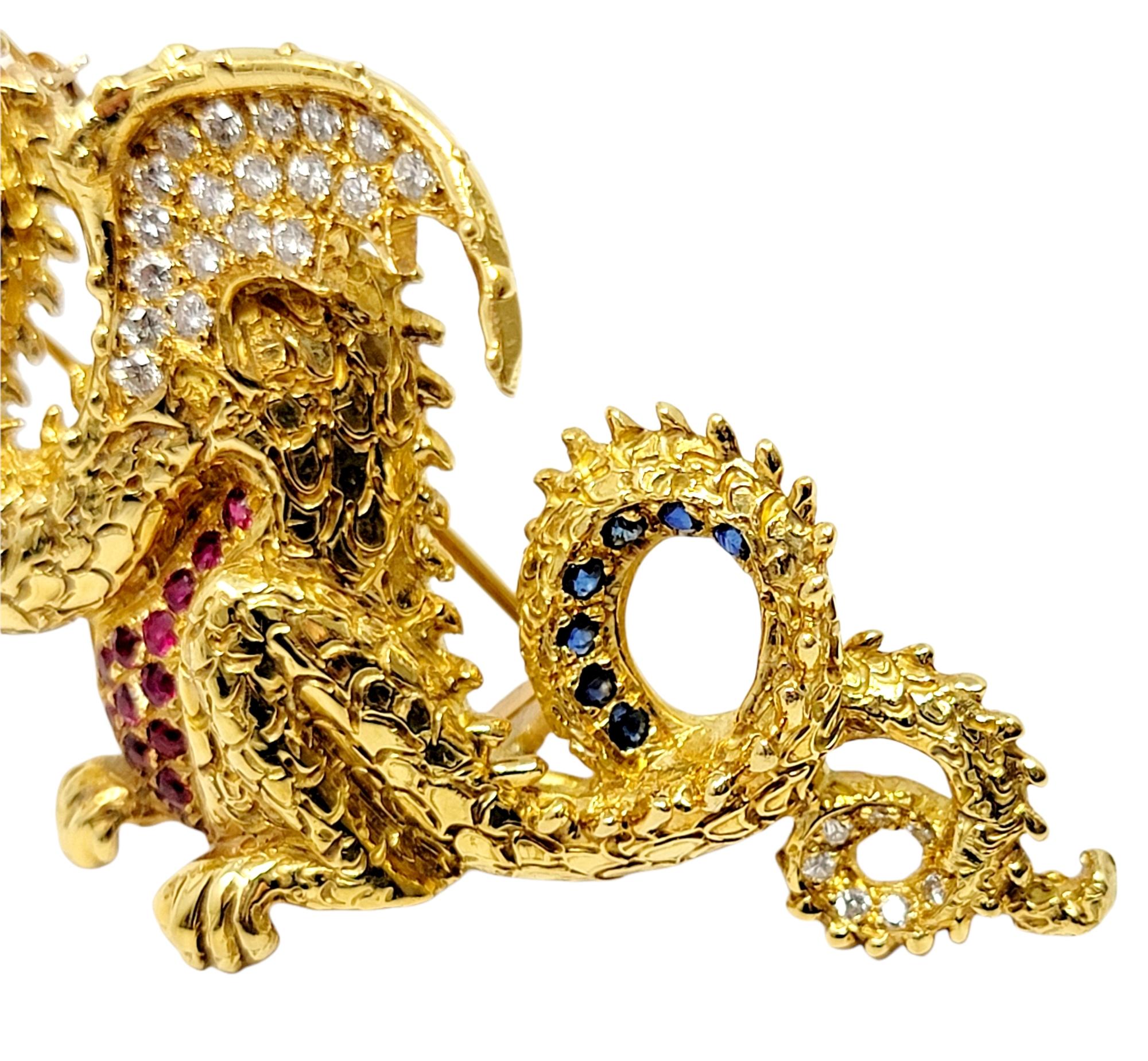 Round Cut Diamond, Ruby and Sapphire Dragon Brooch 18 Karat Yellow Gold .93 Carats Total  For Sale