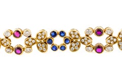 Pulsera Floral de Oro con Diamantes, Rubíes y Zafiros