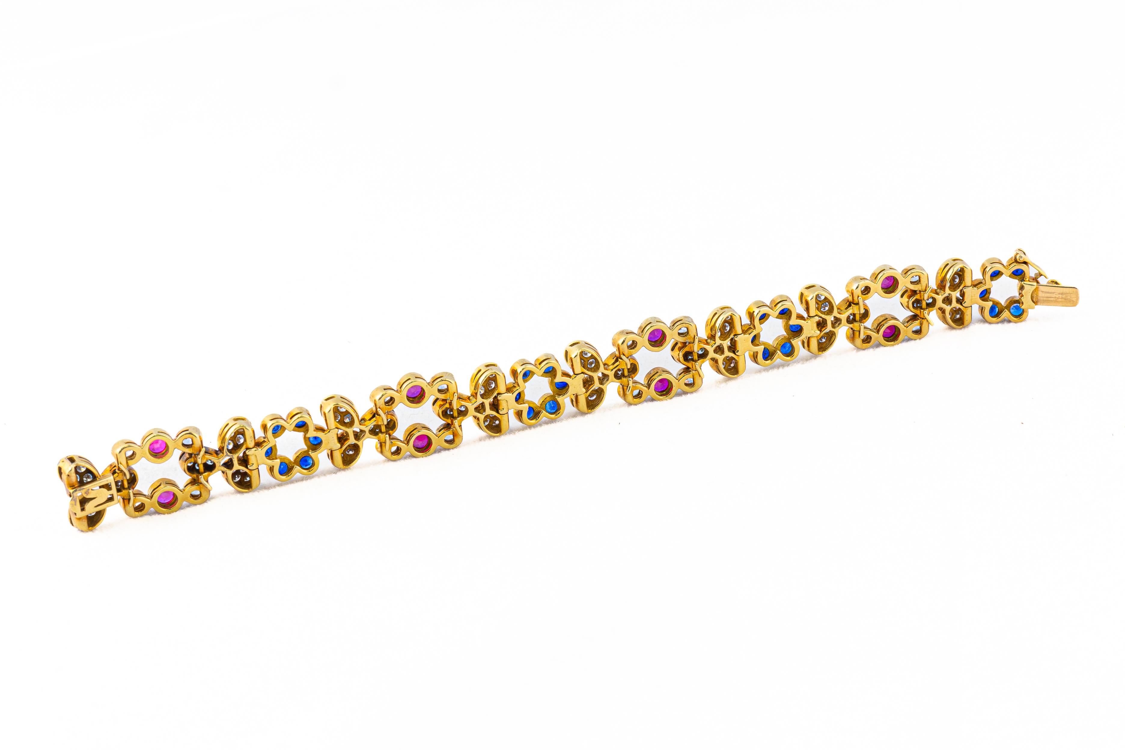 Retro Diamond, Ruby, and Sapphire Gold Floral Bracelet For Sale