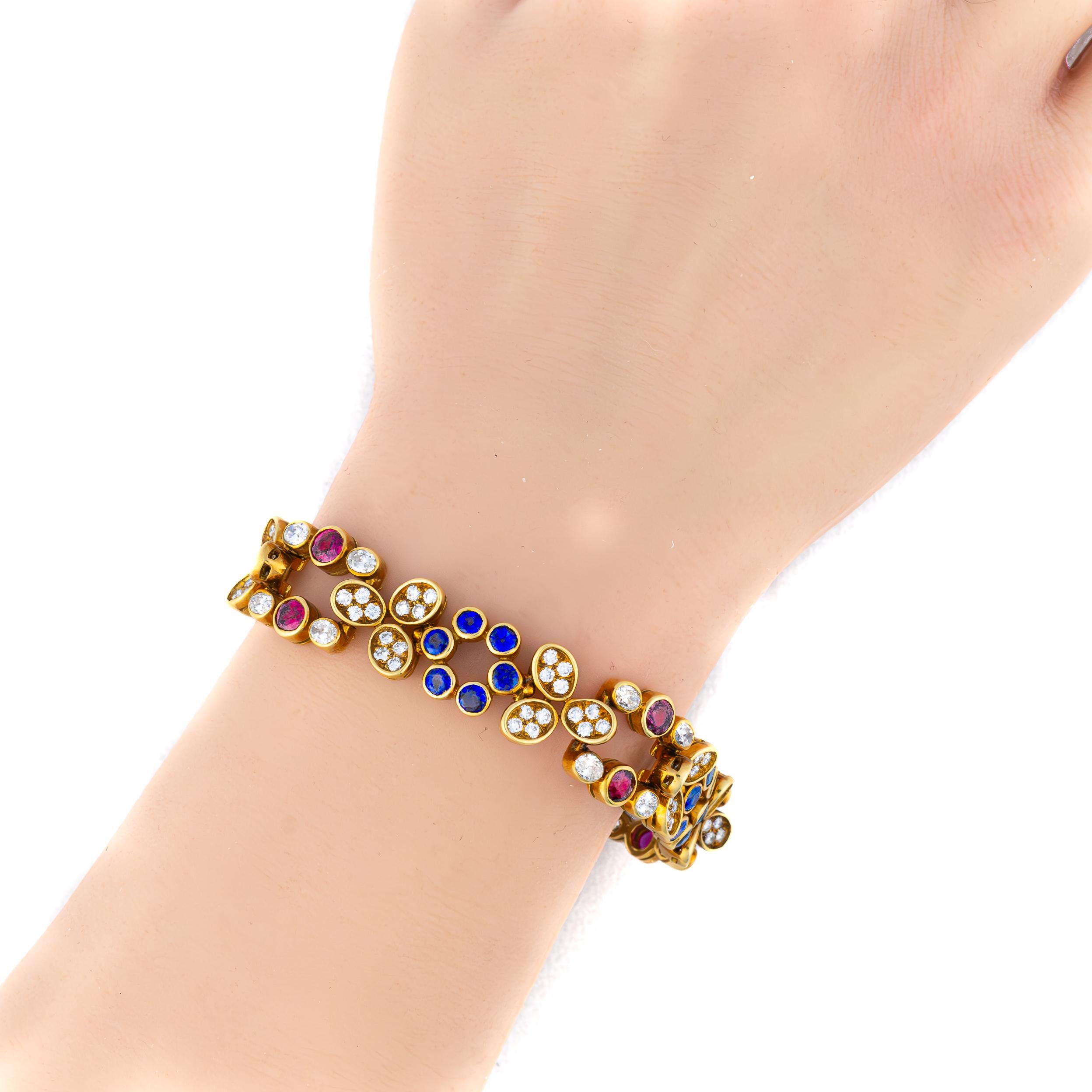 Brilliant Cut Diamond, Ruby, and Sapphire Gold Floral Bracelet For Sale