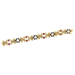 Diamond, Ruby, and Sapphire Gold Floral Bracelet