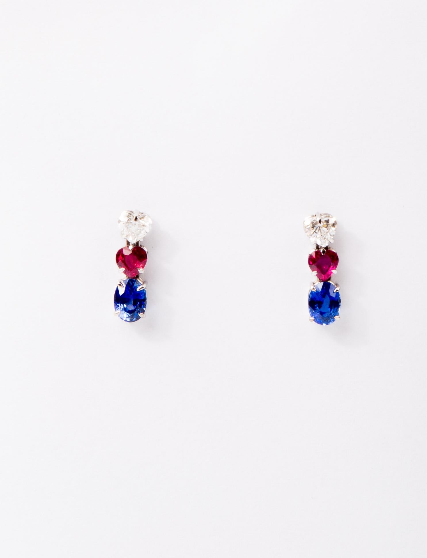 Diamond pair heart shaped 1.86 ct vis,
Sapphire pair blue oval 2.7 ct
Ruby pair heart shaped 1.01 ct