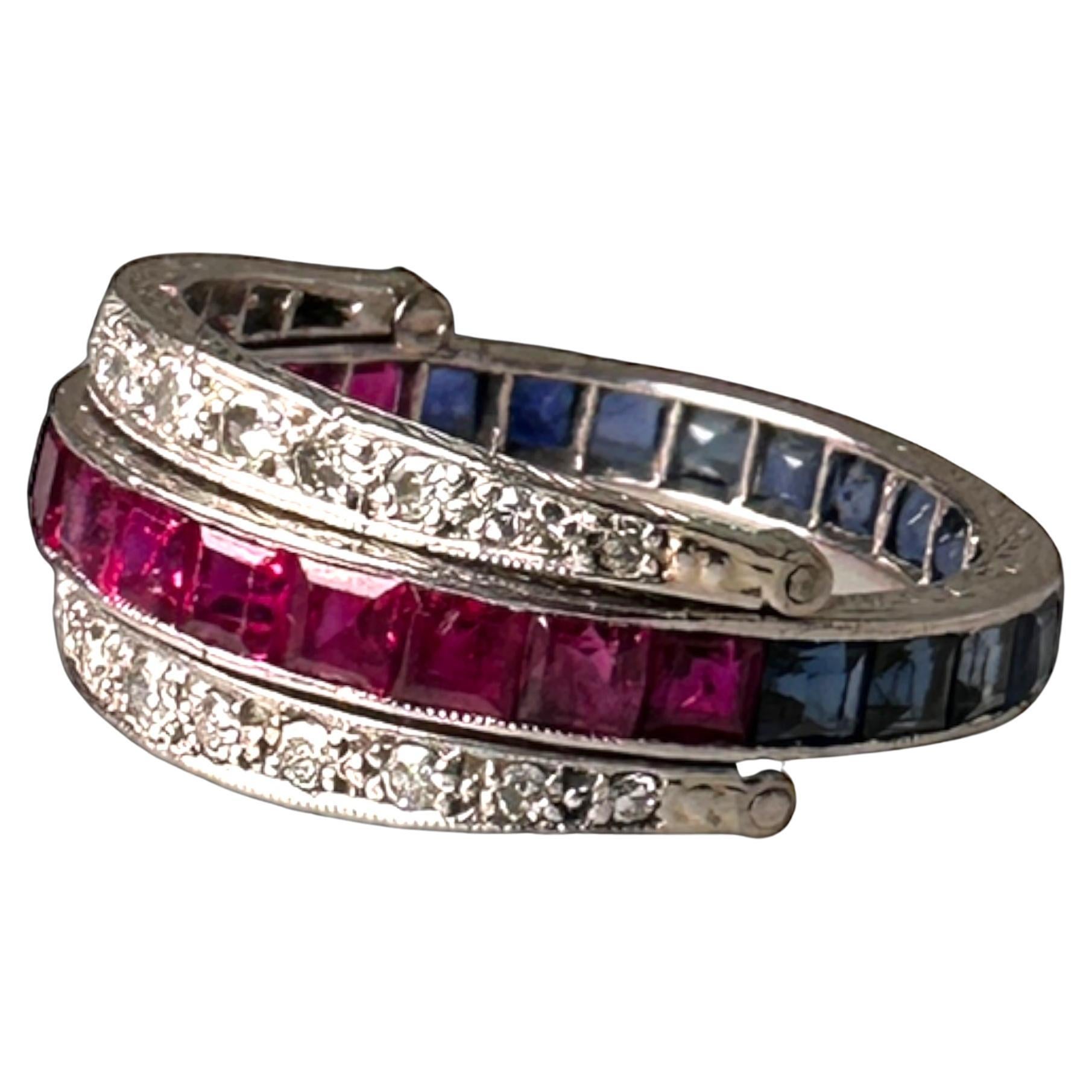 The Diamond, Ruby, and Sapphire Night and Day ring set in Platinum from the 1920s is a breathtaking treasure that will elevate any jewelry collection. This exquisite piece showcases the artistry and elegance of the Roaring Twenties. The dazzling