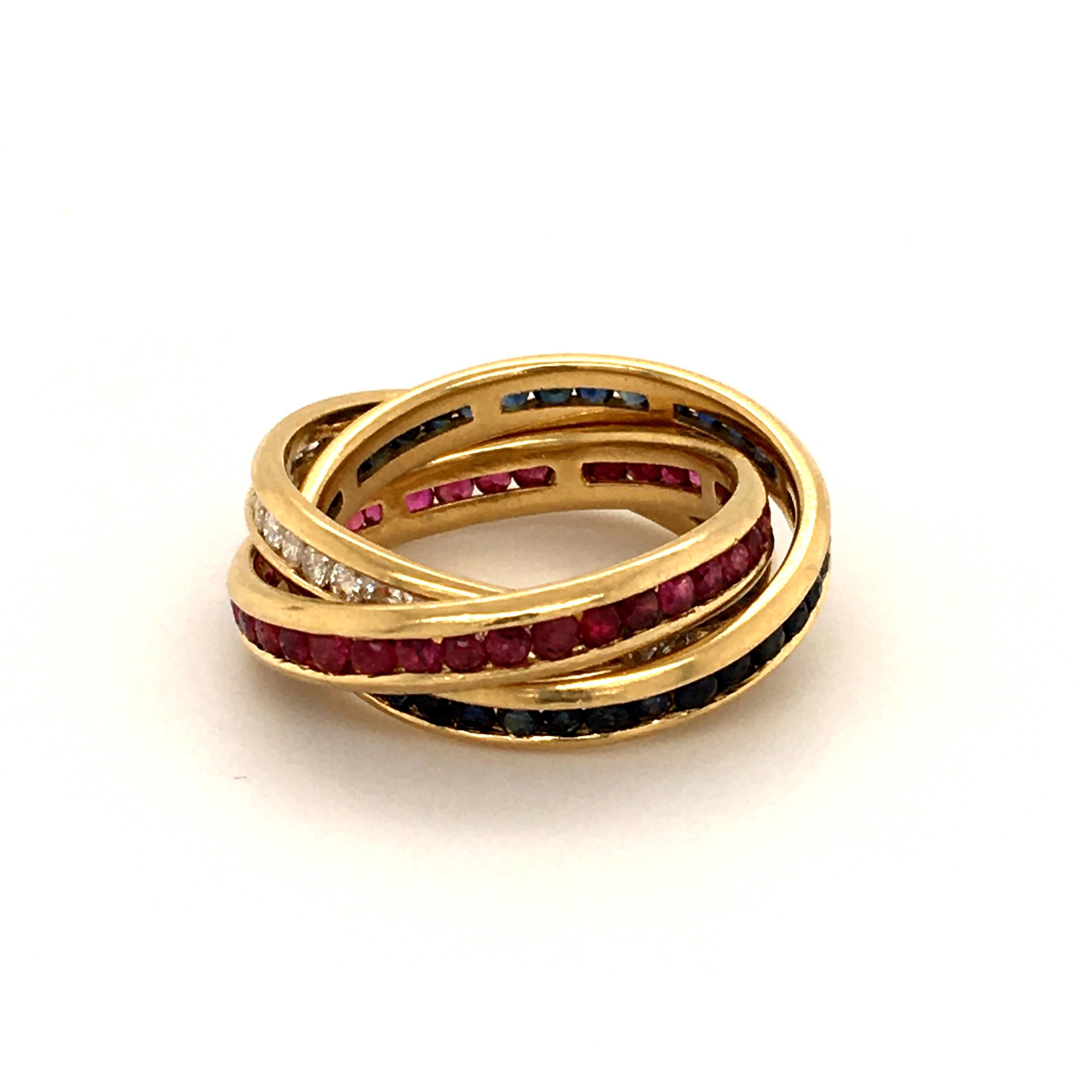 Contemporary Diamond, Ruby and Sapphire Trinity Ring in Yellow Gold